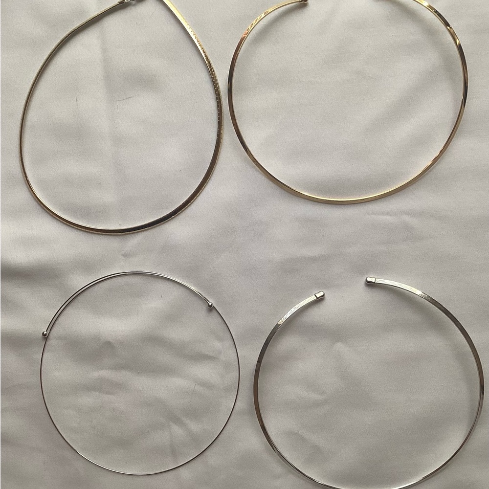 Three Necklaces Two Gold-colored Two Silver-colored